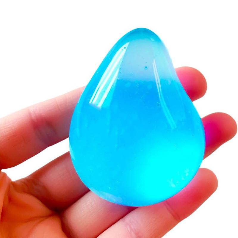 Schylling NeeDoh Dream Drop - Sensory Toy with a Dreamy Smooth Squeeze - Raindrop Shape in Assorted Colors Blue, Pink, and Purple - One Random Color