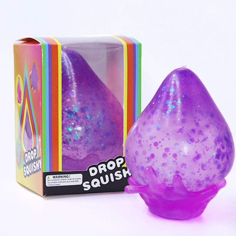 Schylling NeeDoh Dream Drop - Sensory Toy with a Dreamy Smooth Squeeze - Raindrop Shape in Assorted Colors Blue, Pink, and Purple - One Random Color