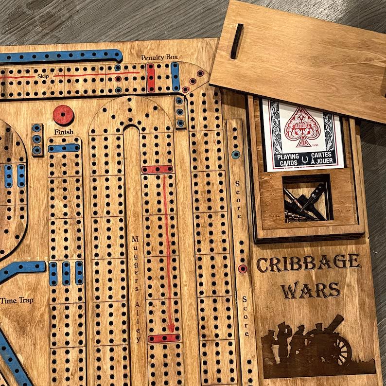 1 Pcs Cribbage Wars Board Game (17.72 x 13.78 inch) Cribbage War Game Wooden Cribbage Board Game Set with Built-in Storage Compartment for Cribbage Pegs and Cards Family Games for Kids and Adults