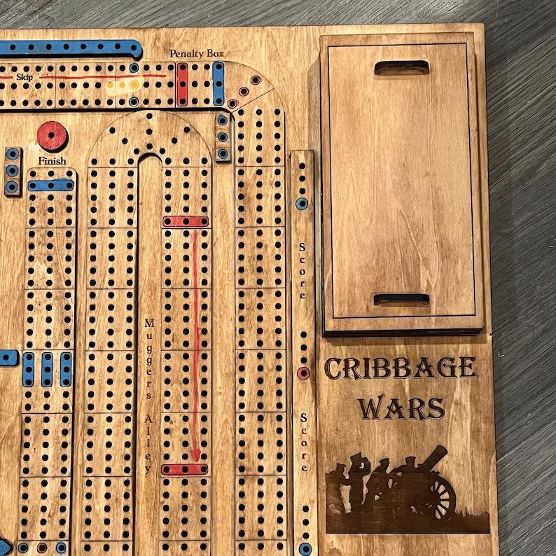 1 Pcs Cribbage Wars Board Game (17.72 x 13.78 inch) Cribbage War Game Wooden Cribbage Board Game Set with Built-in Storage Compartment for Cribbage Pegs and Cards Family Games for Kids and Adults