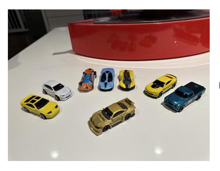 Hot Wheels Set of 8 Basic Toy Cars & Trucks in 1:64 Scale Including 1 Exclusive Car, Styles May Vary, Items May Not be Pictured