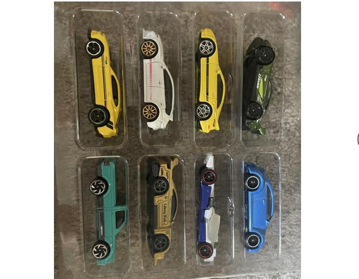 Hot Wheels Set of 8 Basic Toy Cars & Trucks in 1:64 Scale Including 1 Exclusive Car, Styles May Vary, Items May Not be Pictured